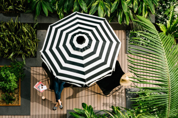 Veriu Camperdown garden umbrella outdoor area with deck and umbrella at Veriu Camperdown