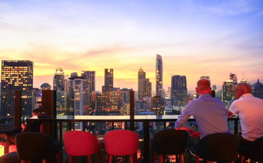 open view of the rooftop with two men drinking