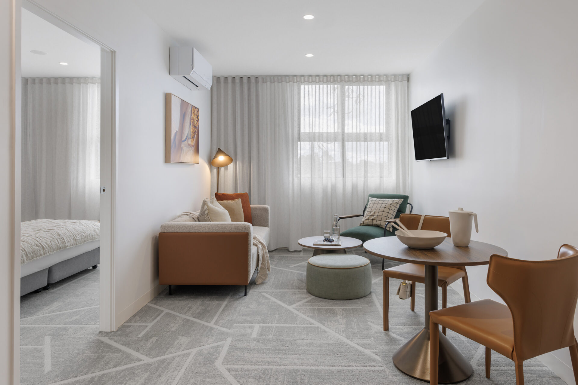 One-bedroom apartment at Punthill Sunshine – modern Sunshine Hospital accommodation with kitchen, lounge, and work desk