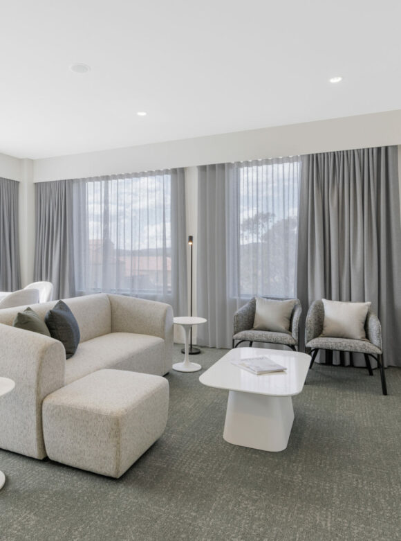 Three Bed 4. Living area, sofa, coffee table, study desk, chairs, TV